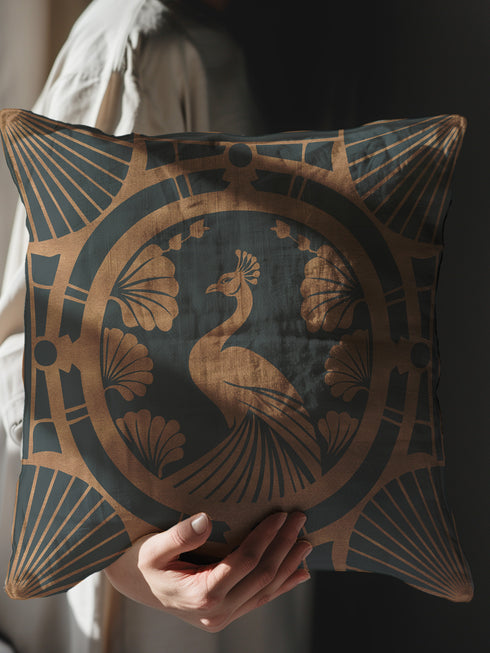 Square pillow cover featuring a stylized copper peacock design centered in a medallion, surrounded by Art Deco fan patterns and shell motifs on a dark forest green background.Square pillow cover featuring a stylized copper peacock design centered in a medallion, surrounded by Art Deco fan patterns and shell motifs on a dark forest green background.